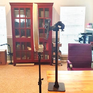 side view of the ring light and arkon remarkable stand setup on a desk
